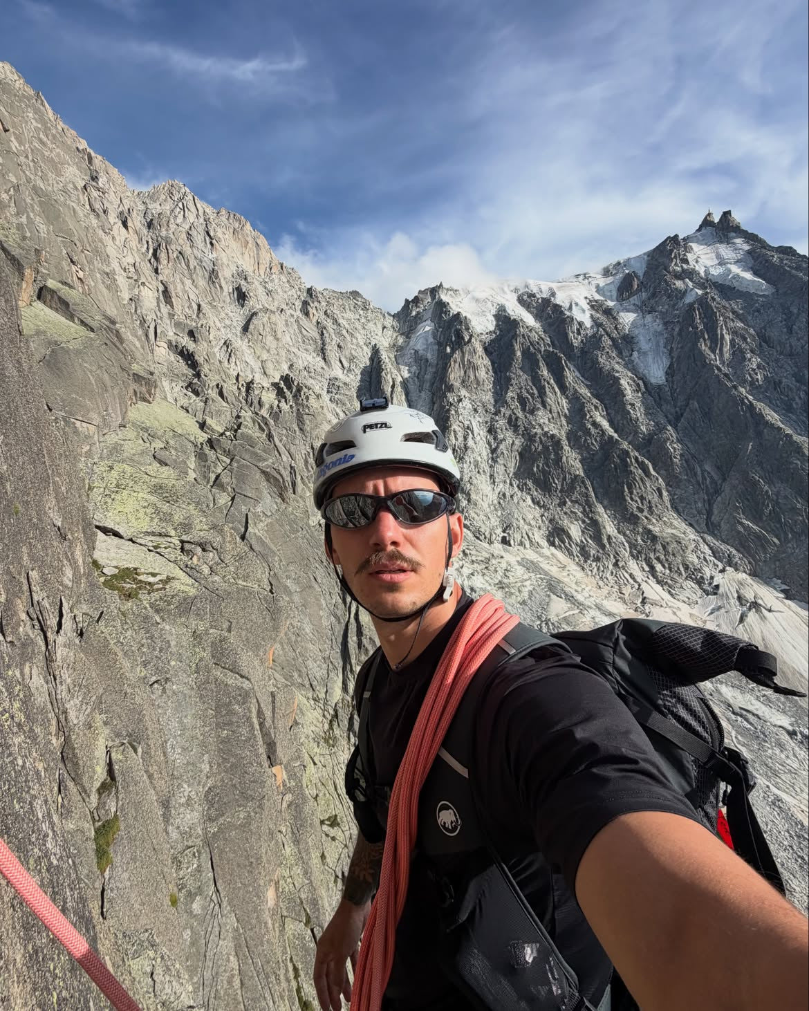 Customer wearing AIM Black Crystal sunglasses — alpine close-up