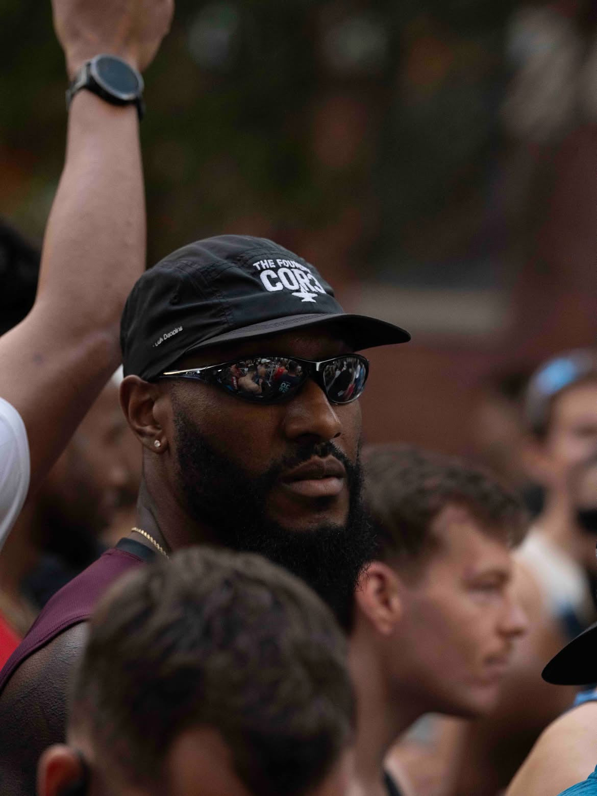Customer wearing AIM Black Crystal sunglasses — customer running at race
