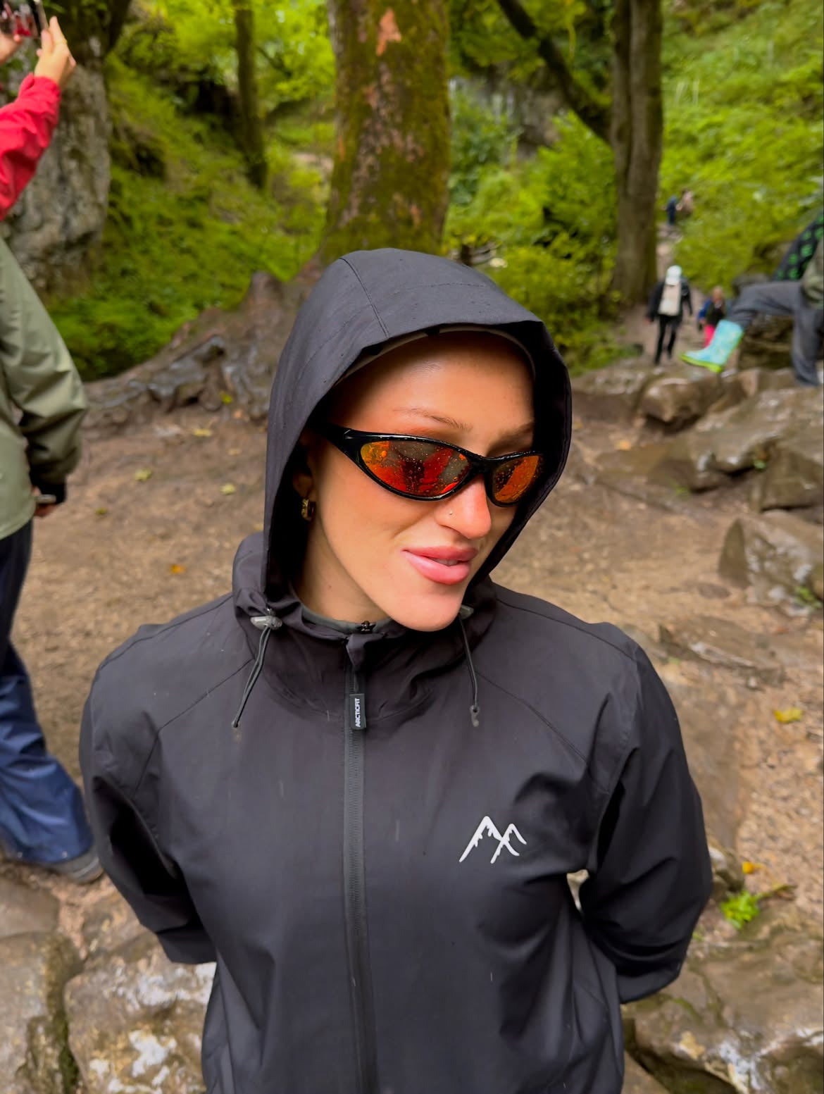Customer wearing AIM Black Heat sunglasses — forest portrait