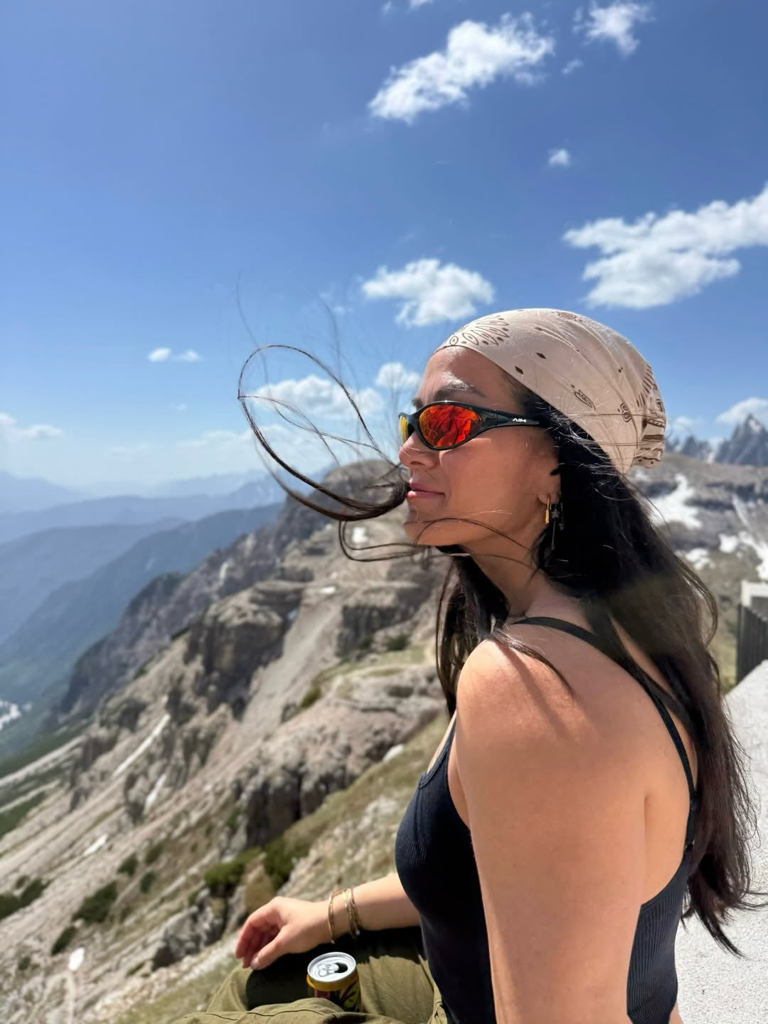 Customer wearing AIM Black Heat sunglasses — mountain profile