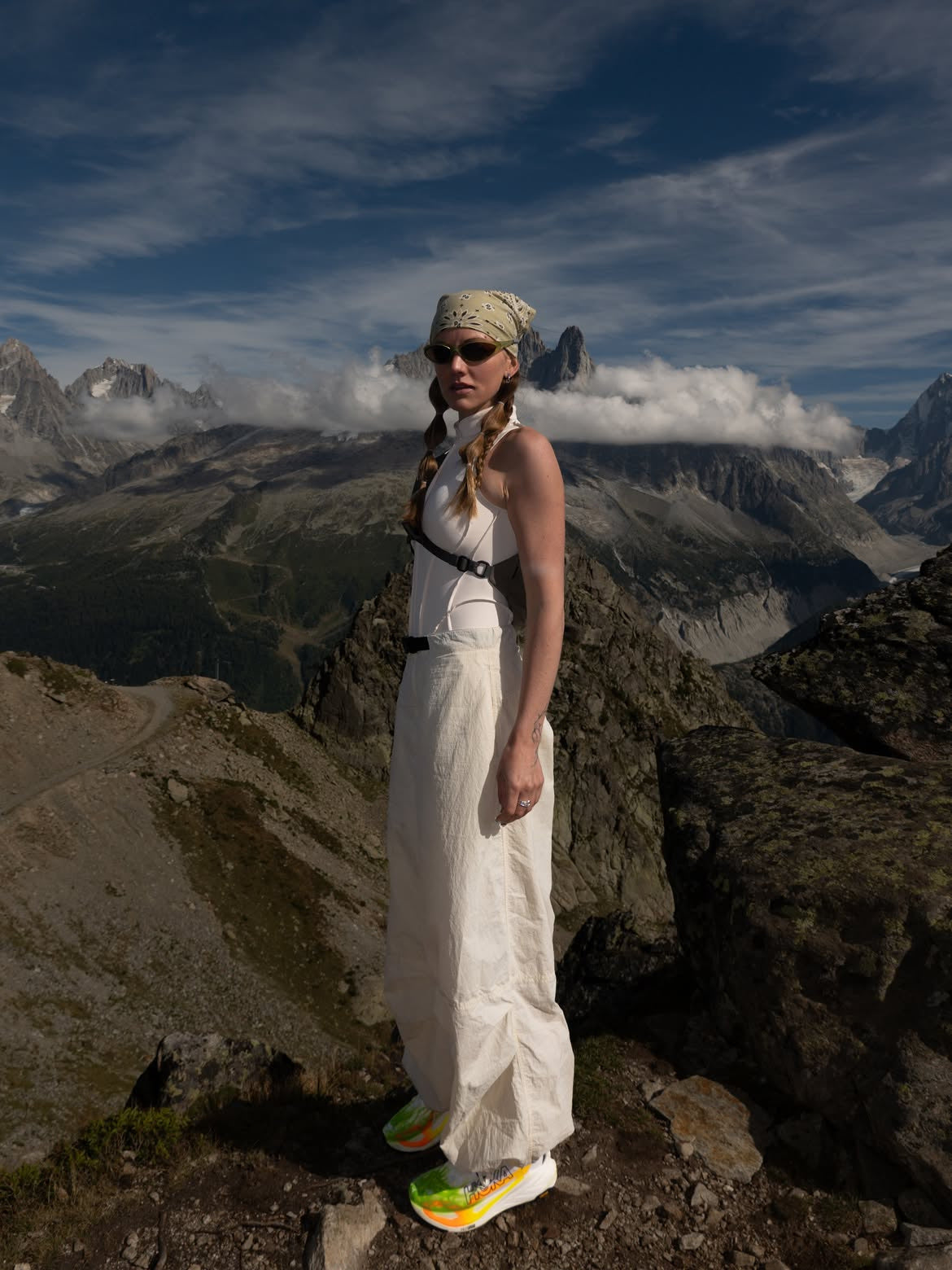 Customer wearing AIM Forest sunglasses — mountain portrait