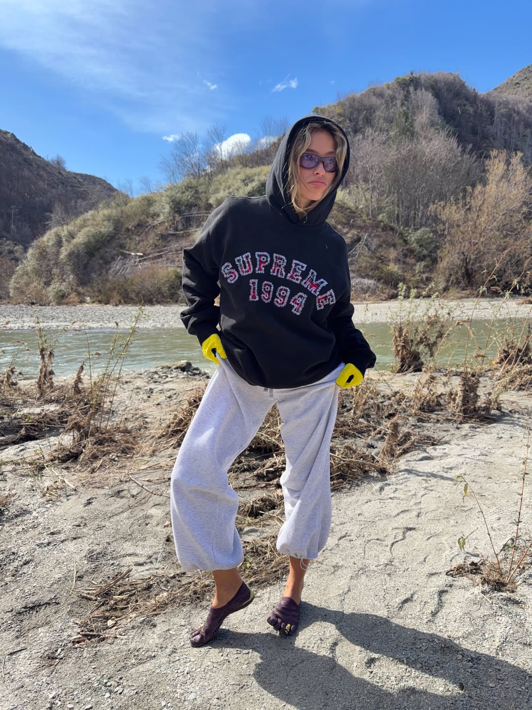 A customer wearing AIM Sunnies - Lavender