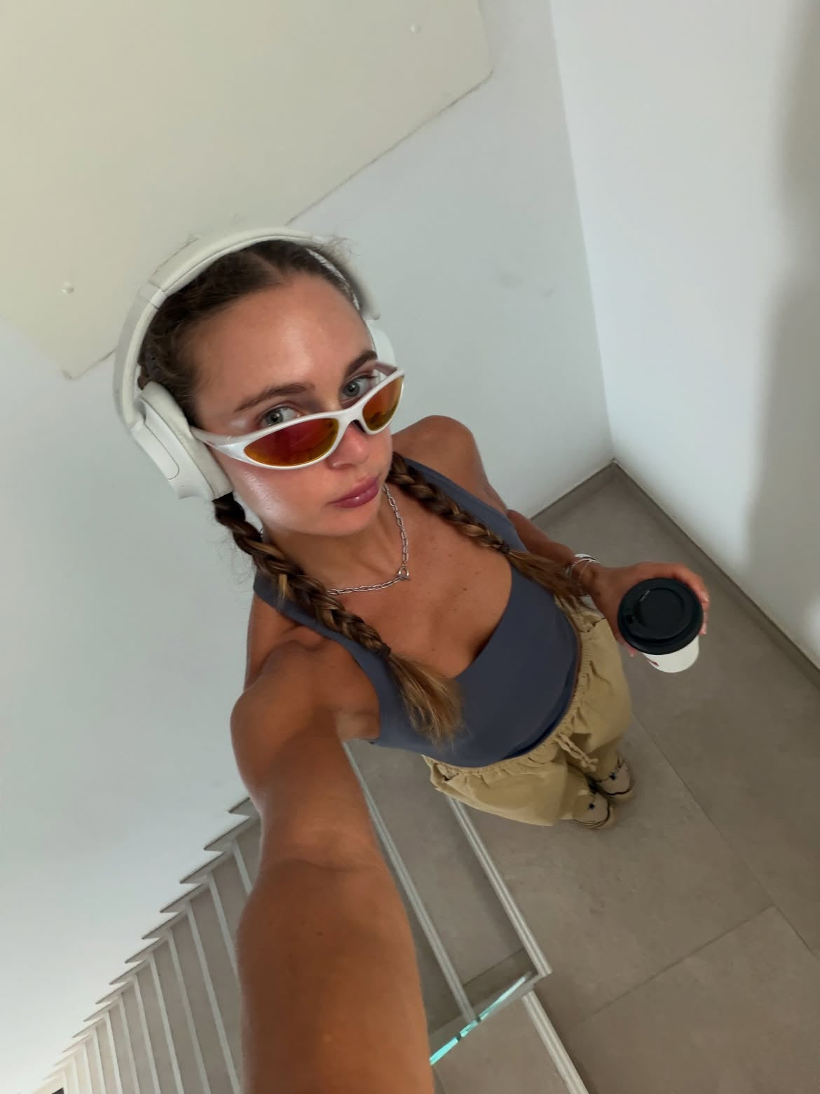 Customer wearing AIM Pearl Heat sunglasses — overhead portrait