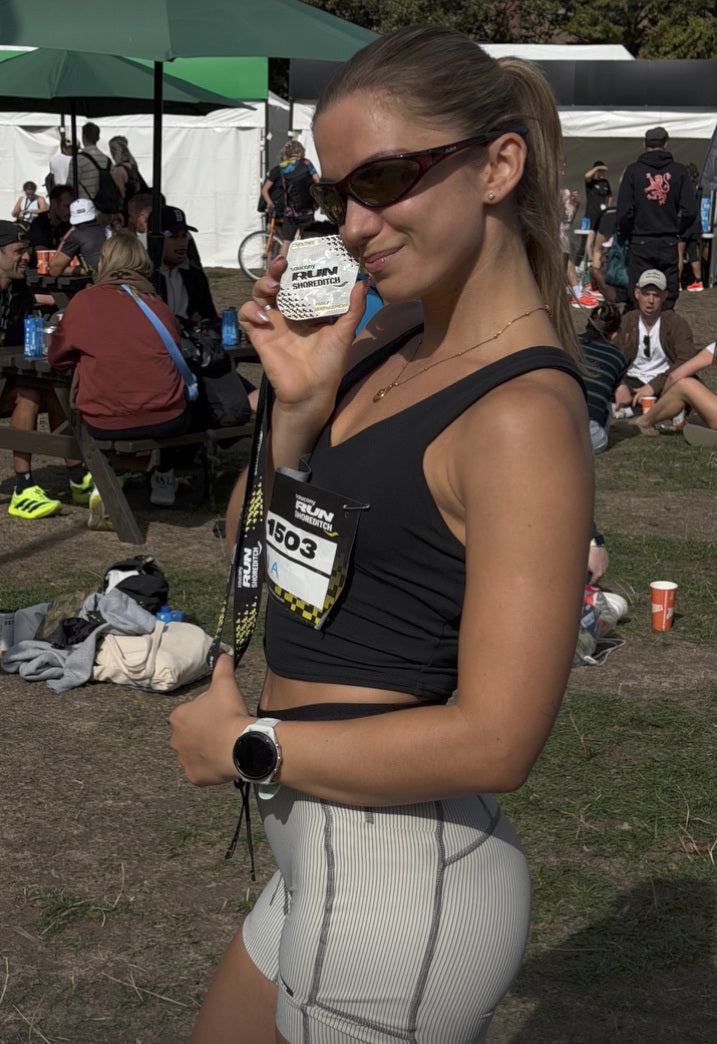 Customer wearing AIM Tortoise sunglasses — london post-race portrait