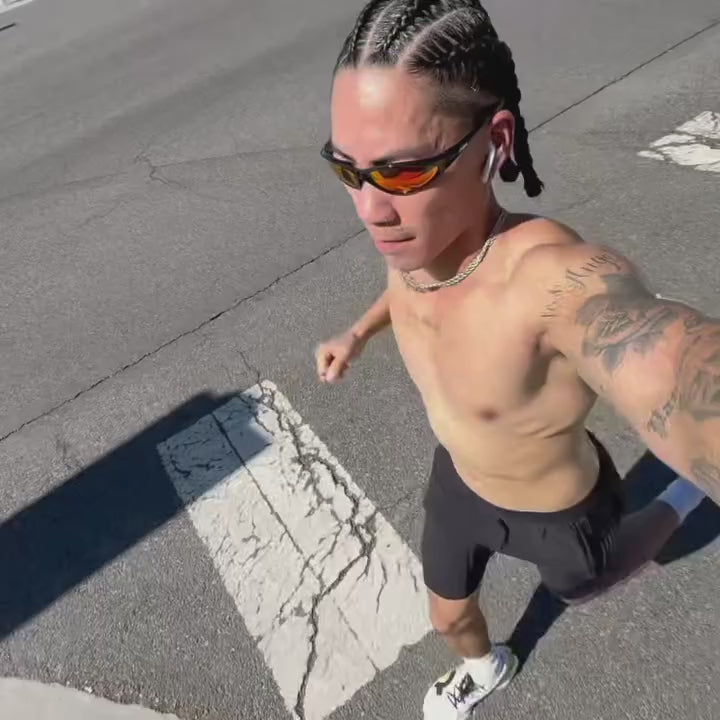 Customer wearing AIM Black Heat sunglasses — running video